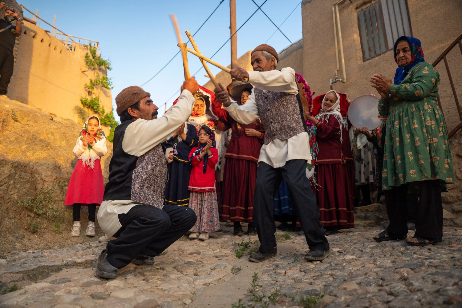 People gathered for a ceremony in Qaleh Bala